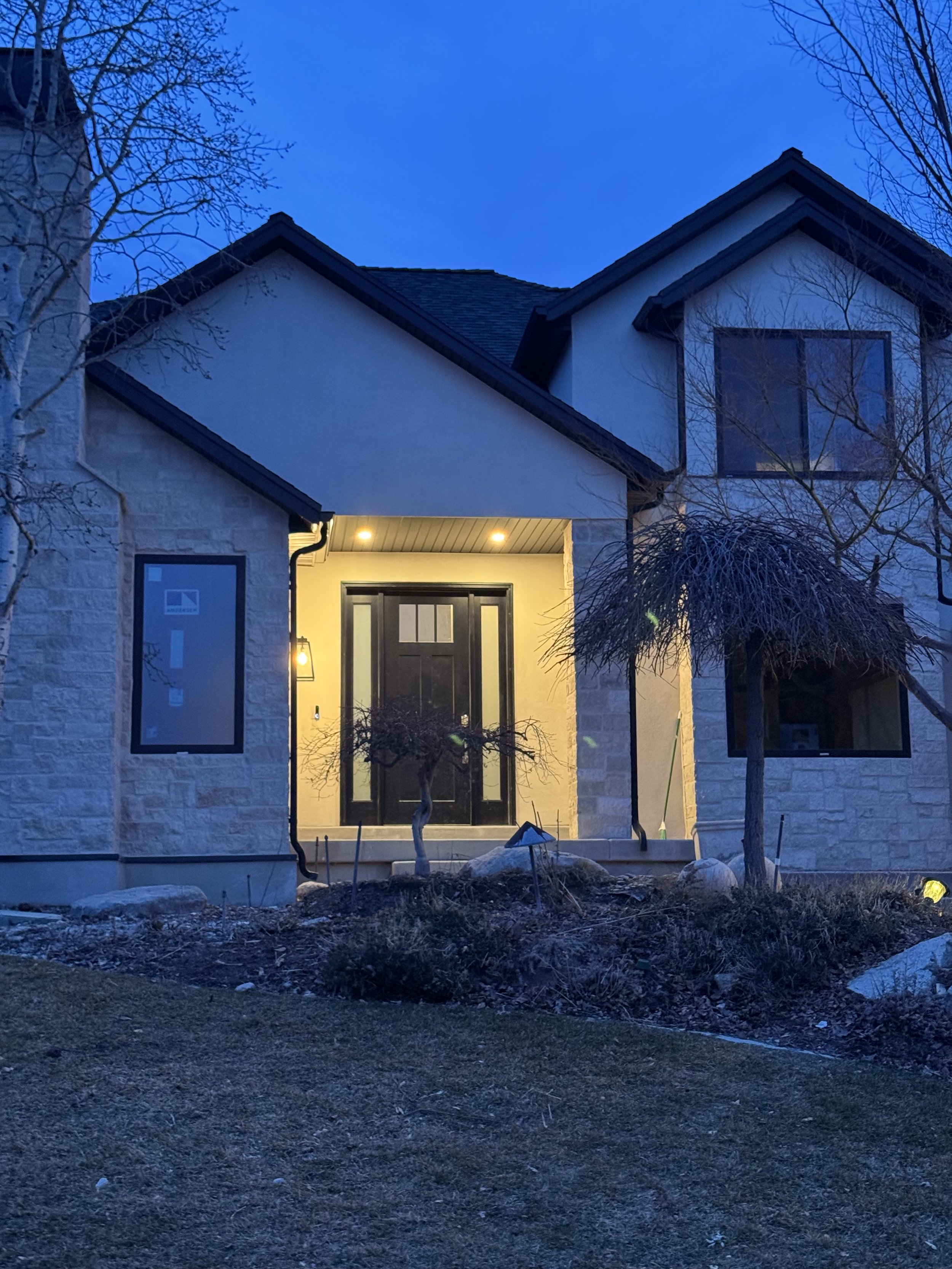 Front entrance of a modern house during dusk