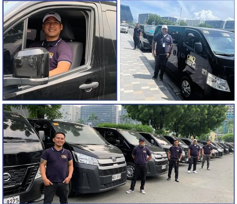 Modern building with wooden exterior, large glass window, set against mountainous landscape with dry grass and sparse trees.