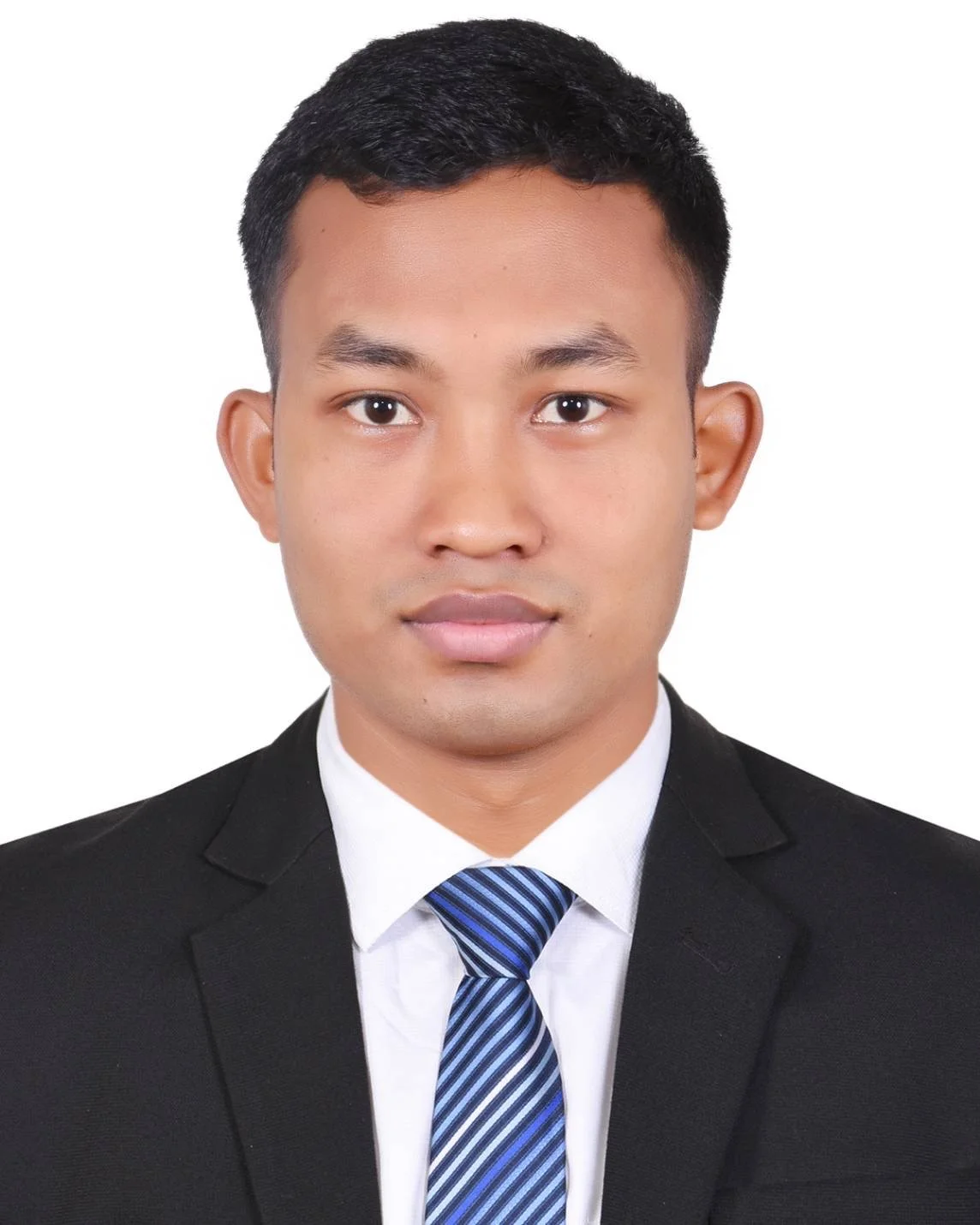 A young man with short black hair wearing a black suit, white shirt, and blue striped tie facing forward against a white background.