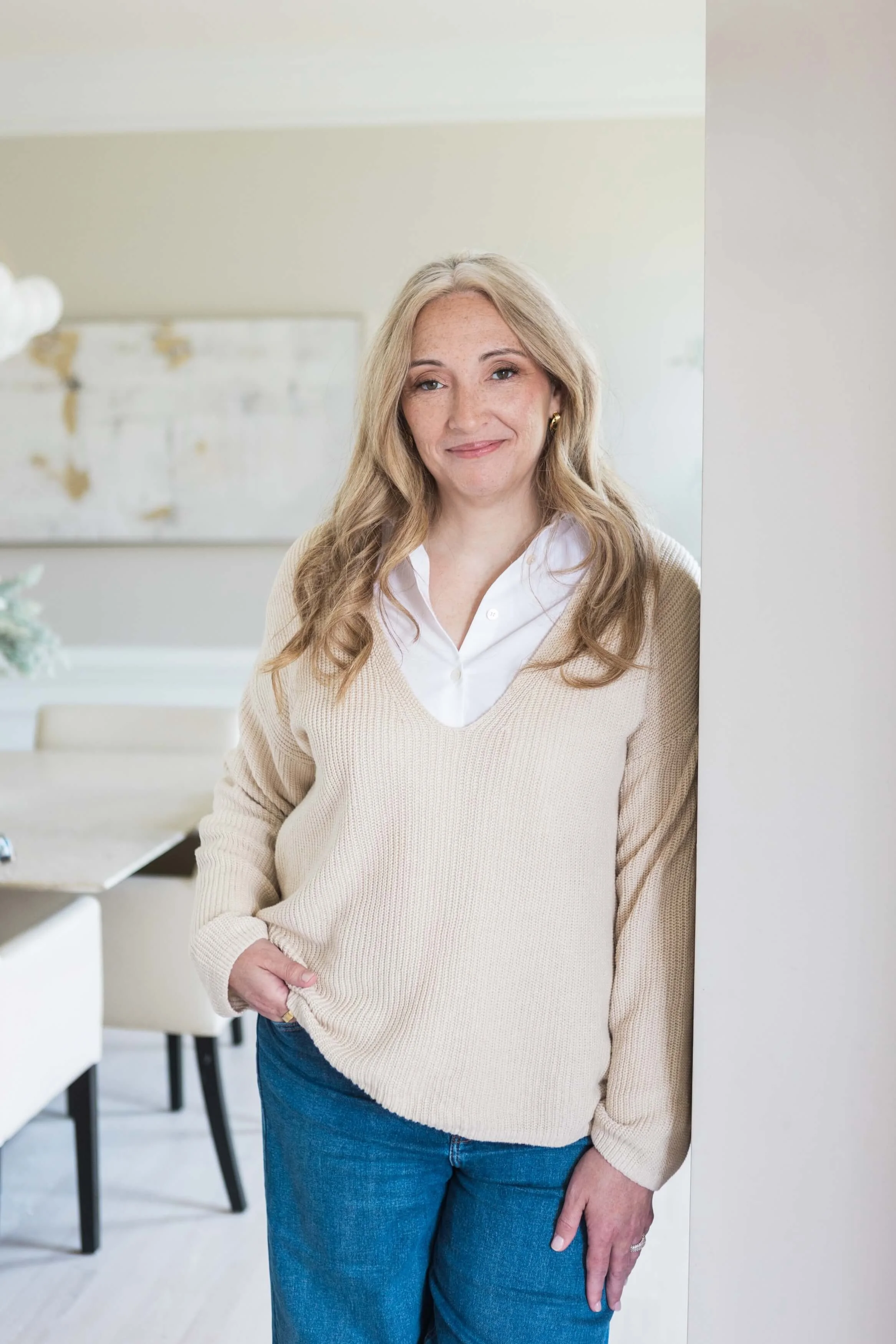 Founder and therapist Sina Jones standing in her Northern Virginia office