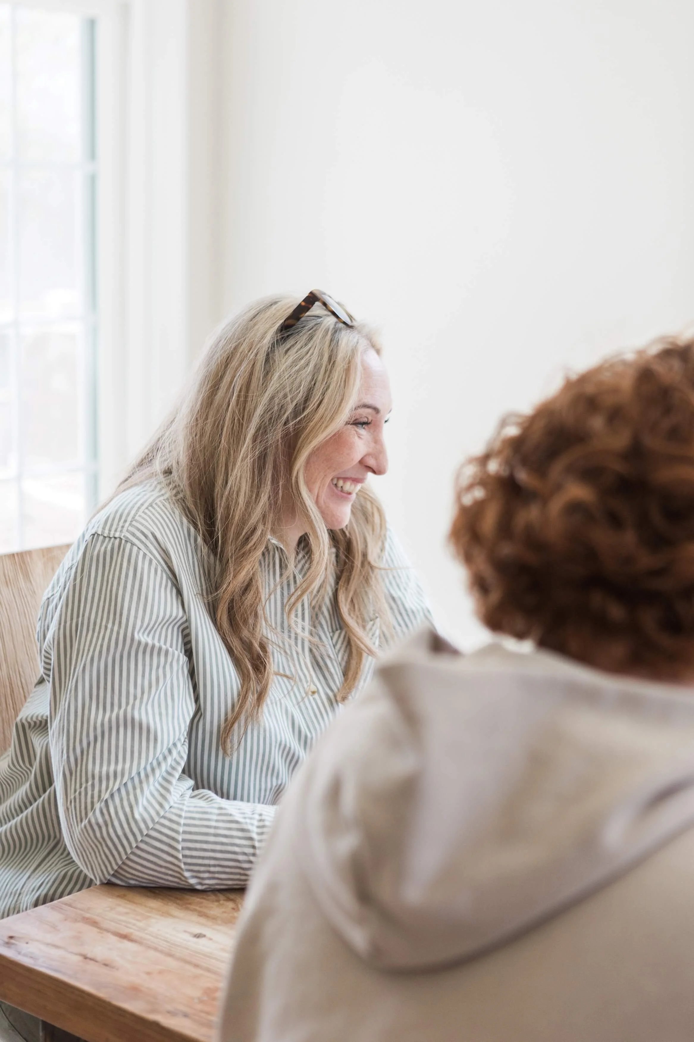 Therapist speaking with a client during an individual therapy session