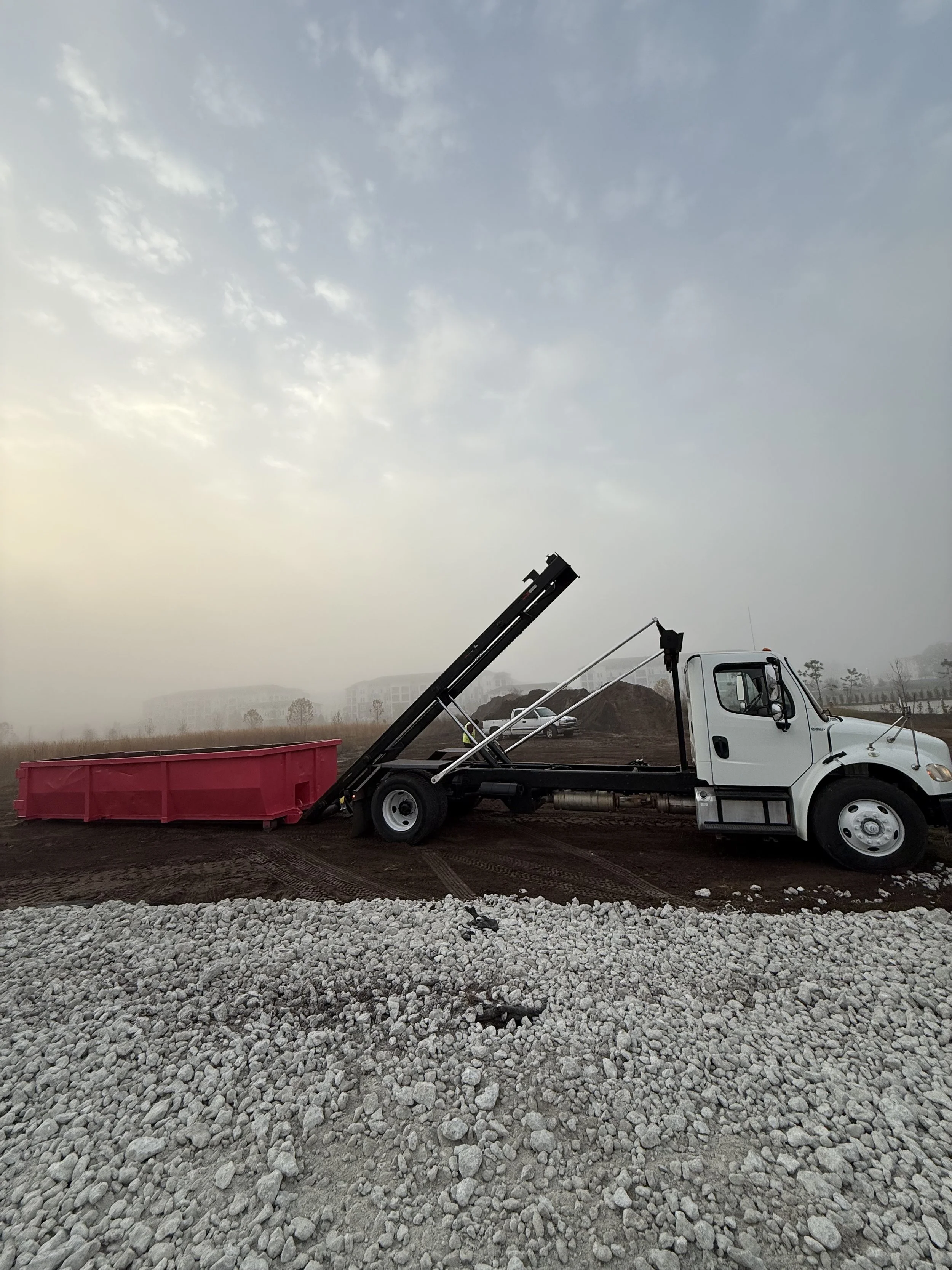 roll off truck at job site