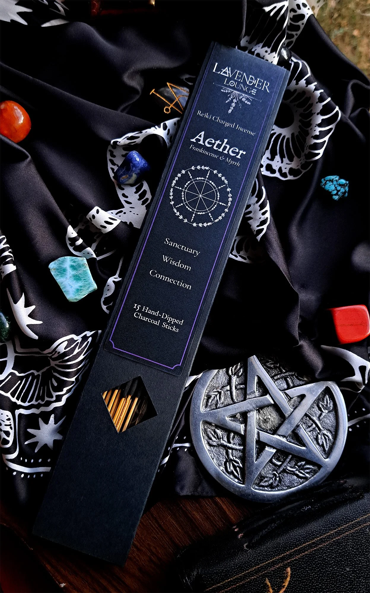 Aether Incense box styled on a small altar space with crystals
