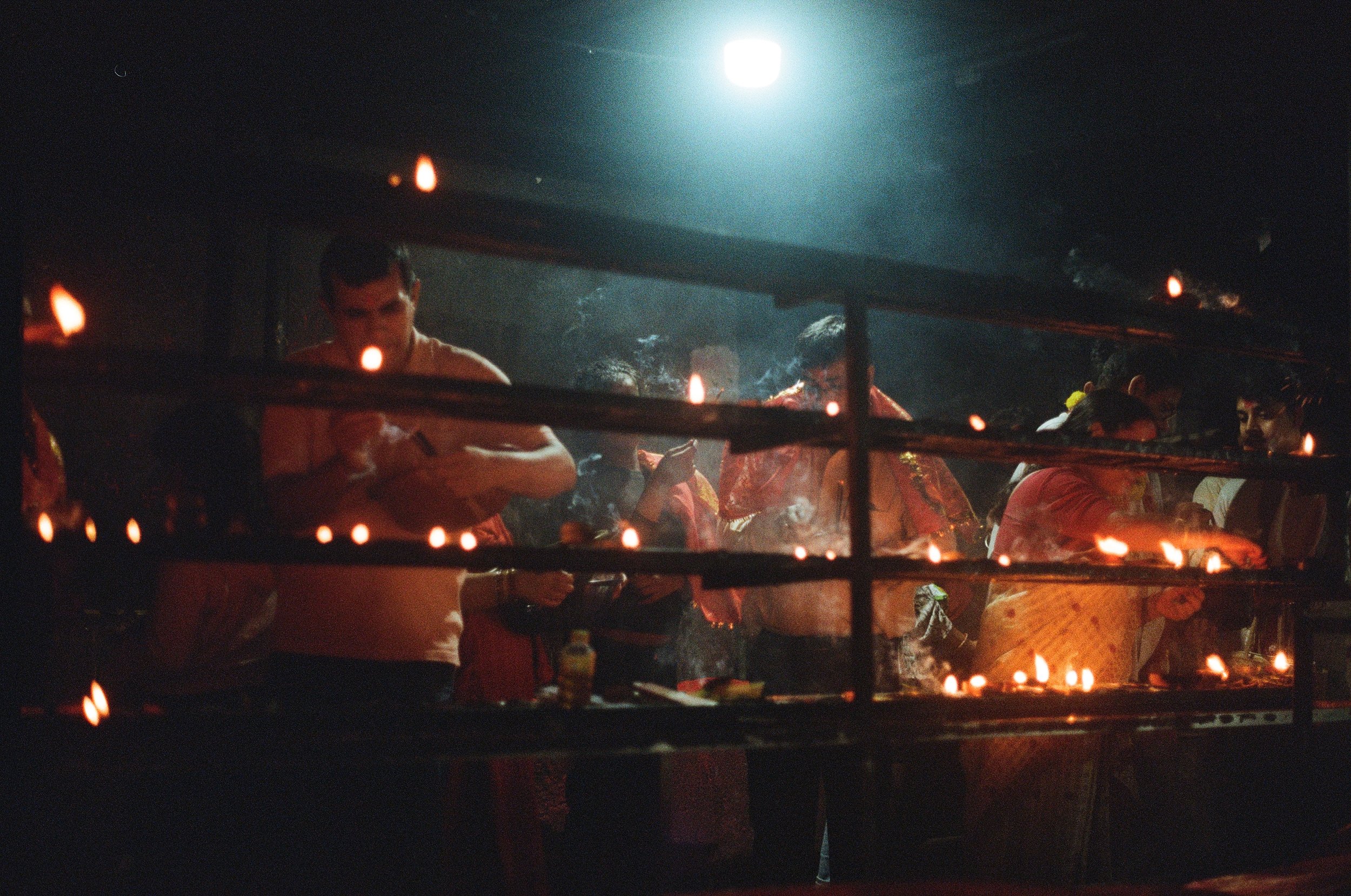 Devotees lighting diyas at the Kamakhya temple, dedicated to Devi, the divine Shakti