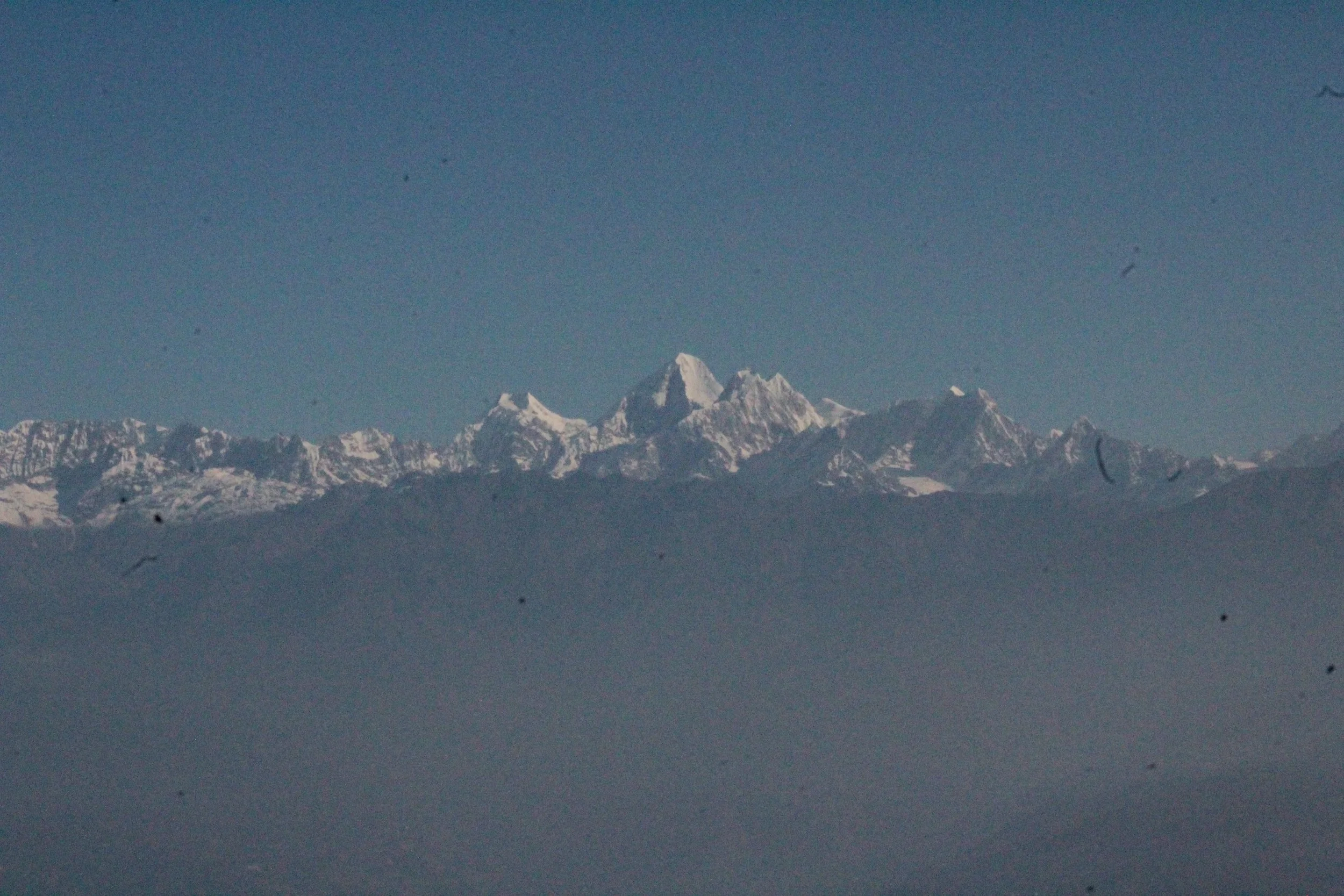 Snow-capped mountain range under clear blue sky, Himalayas, Yoga Retreat, Analogue photography