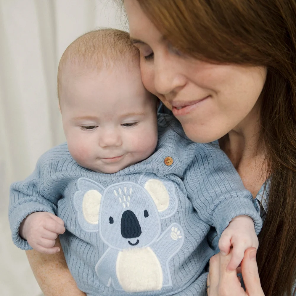 Mum cuddling her baby at the Mummas Circle mothers group in Redcliffe