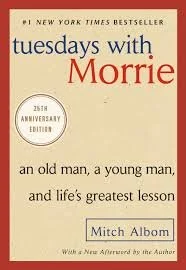 Book cover of 'Tuesdays with Morrie' by Mitch Albom, celebrating its 25th anniversary edition, featuring a beige background with red and black text.
