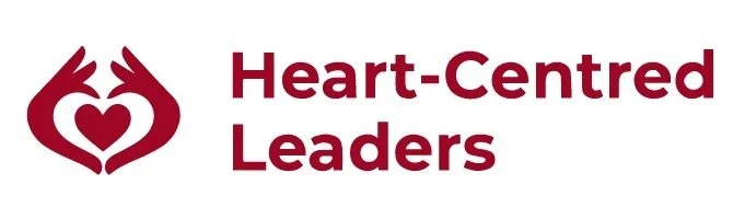 Logo with stylized heart made of two hands and the text 'Heart-Centered Leaders'