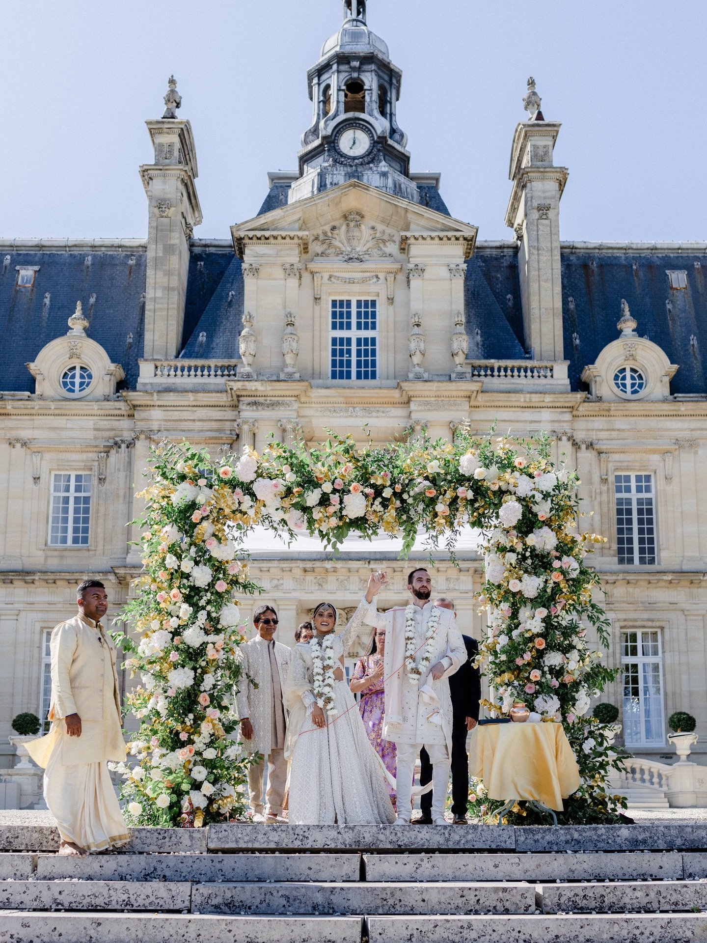 An Indian wedding ceremony in the gardens of a French ch&acirc;teau near Paris called @chateau_smdt. 
The powerful rhythm of the dhol drums echoing through the gardens as the groom walks it , the sacred chants of the Indian priest blessing the union 