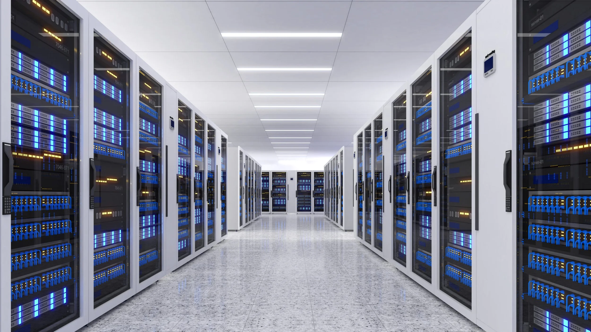 A data center with rows of server racks containing blue-lit servers, clean white walls, and a polished gray floor.