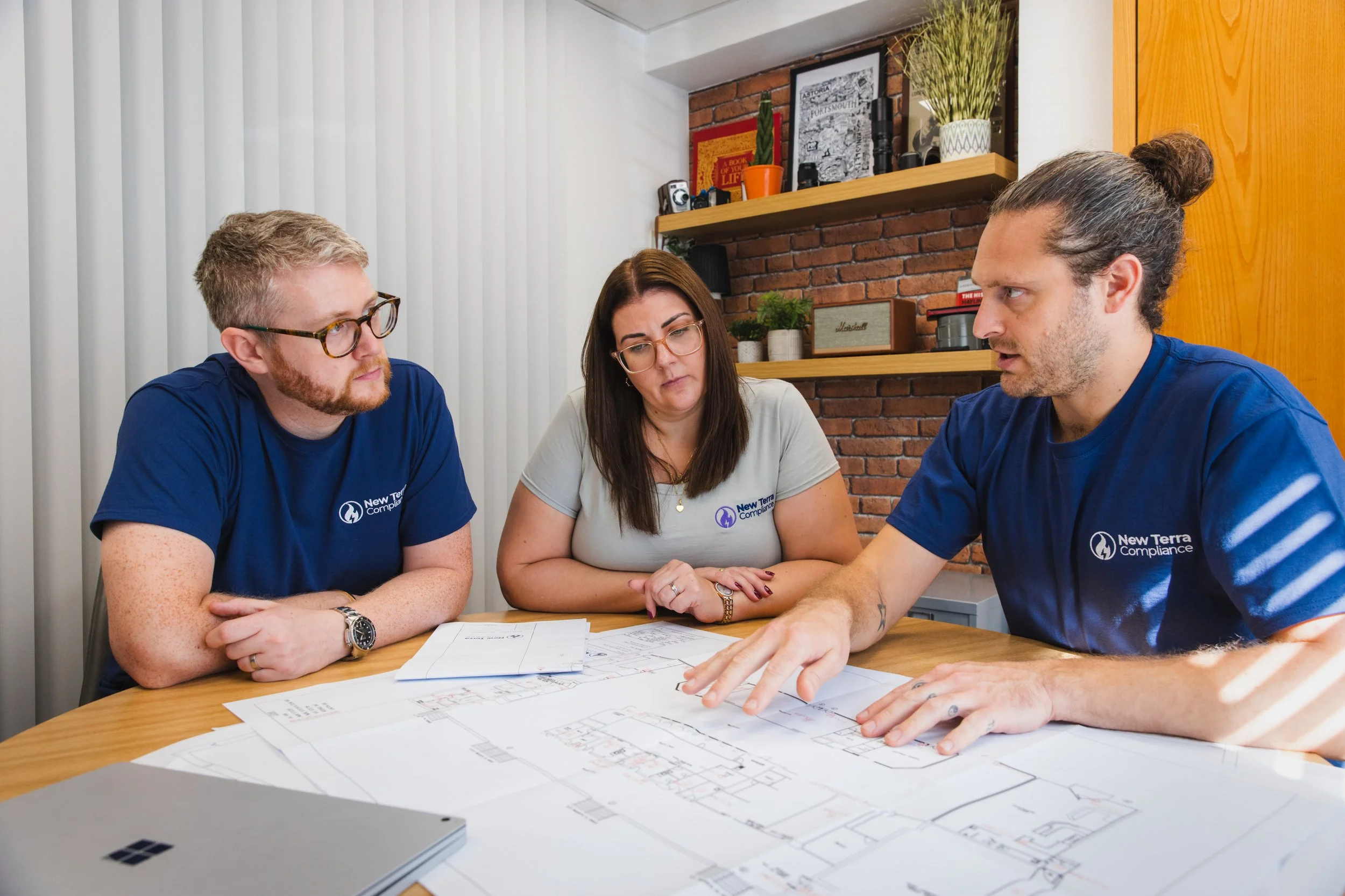 Fire consultants New Terra Compliance discussing a construction project