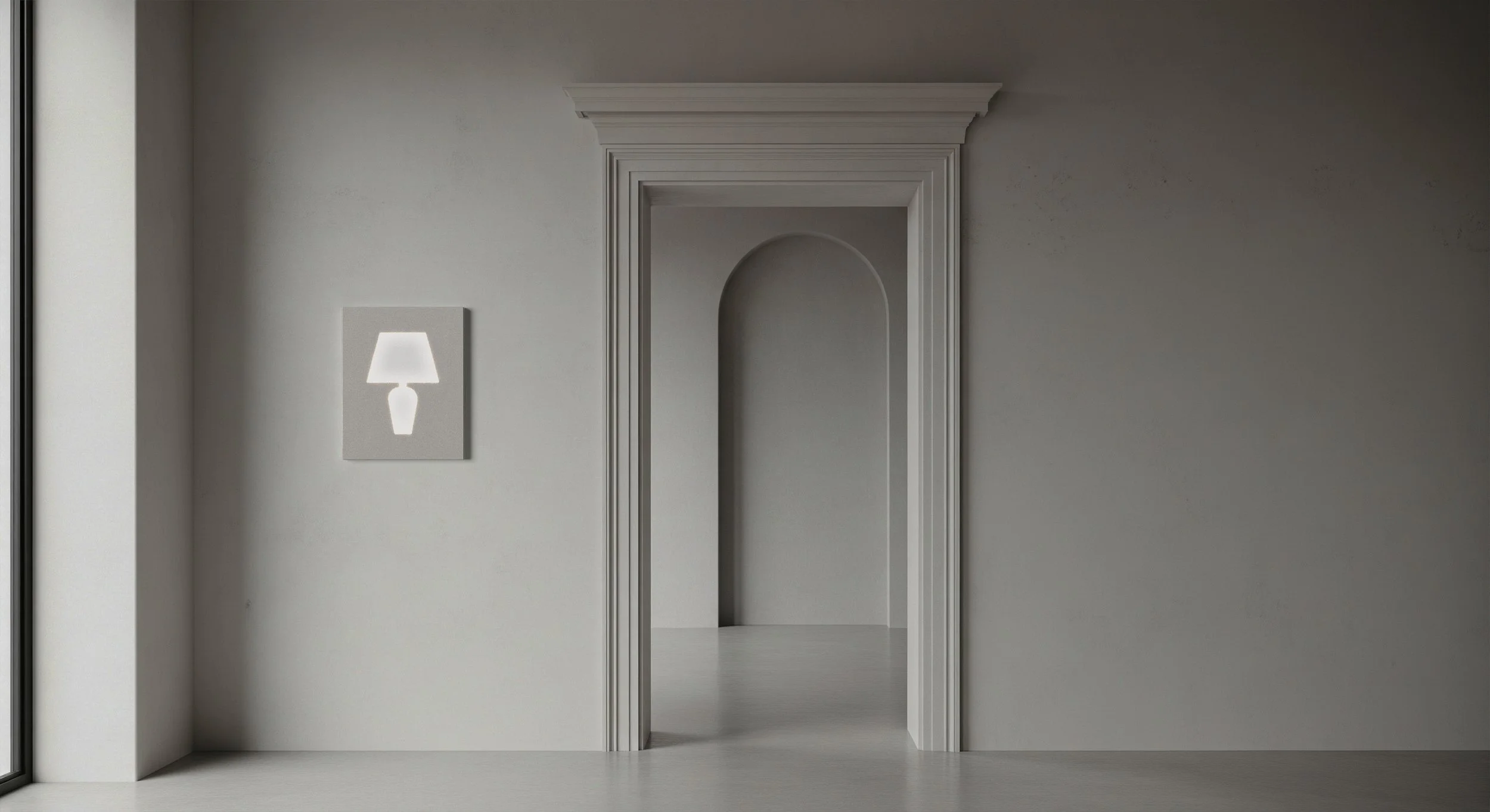 Interior space with a doorway featuring decorative molding, a wall sign with a lamp icon indicating a lighting area, and a minimalistic, modern design.