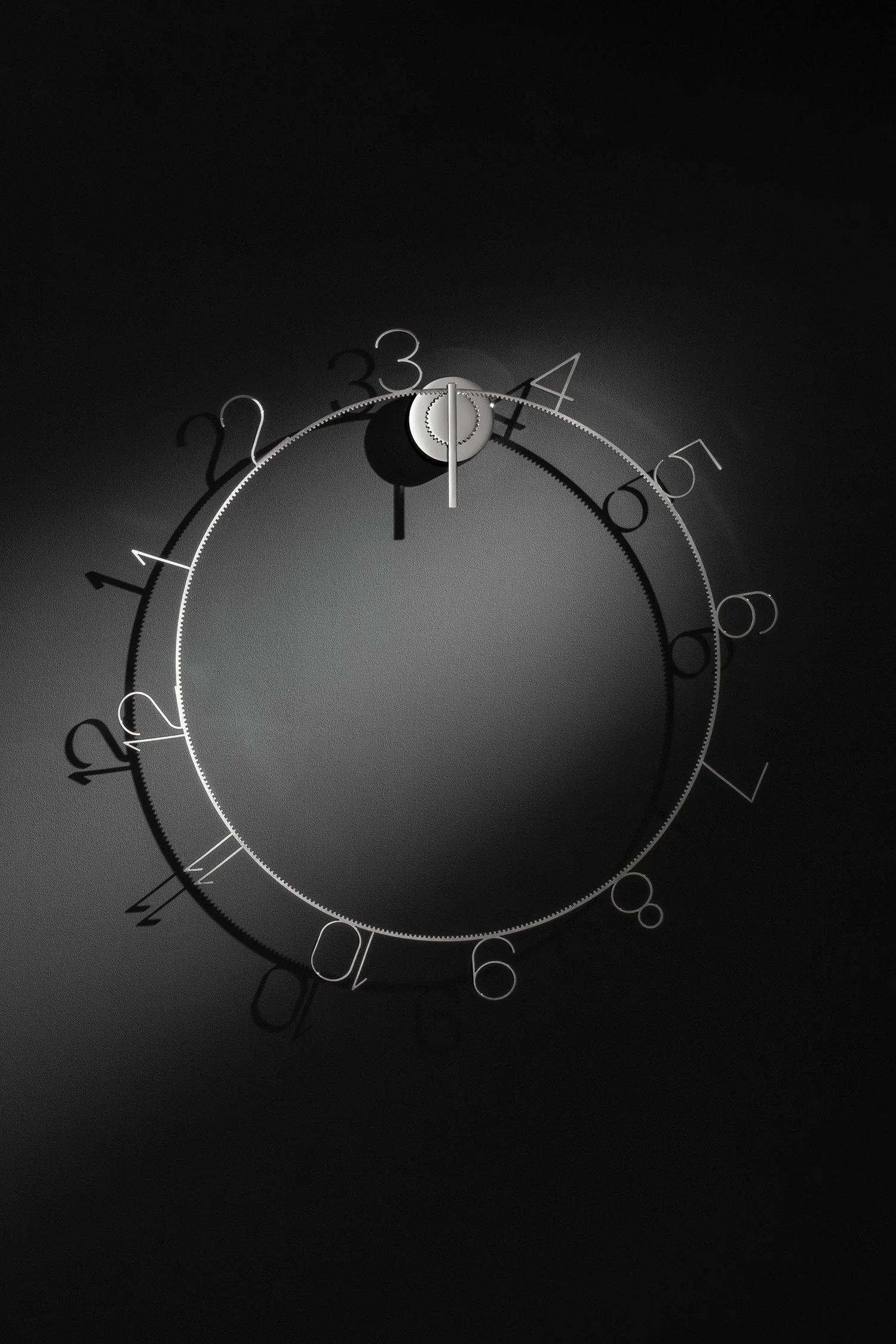 Mike Simonelli Product Design OClock Wall Clock On Black Wall Front View Red Dot Award Portrait.jpg