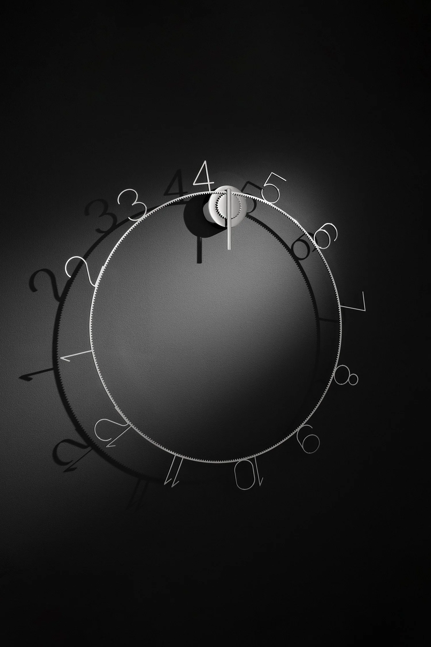 Mike Simonelli Product Design OClock Wall Clock On Black Wall Red Dot Award Portrait.jpg