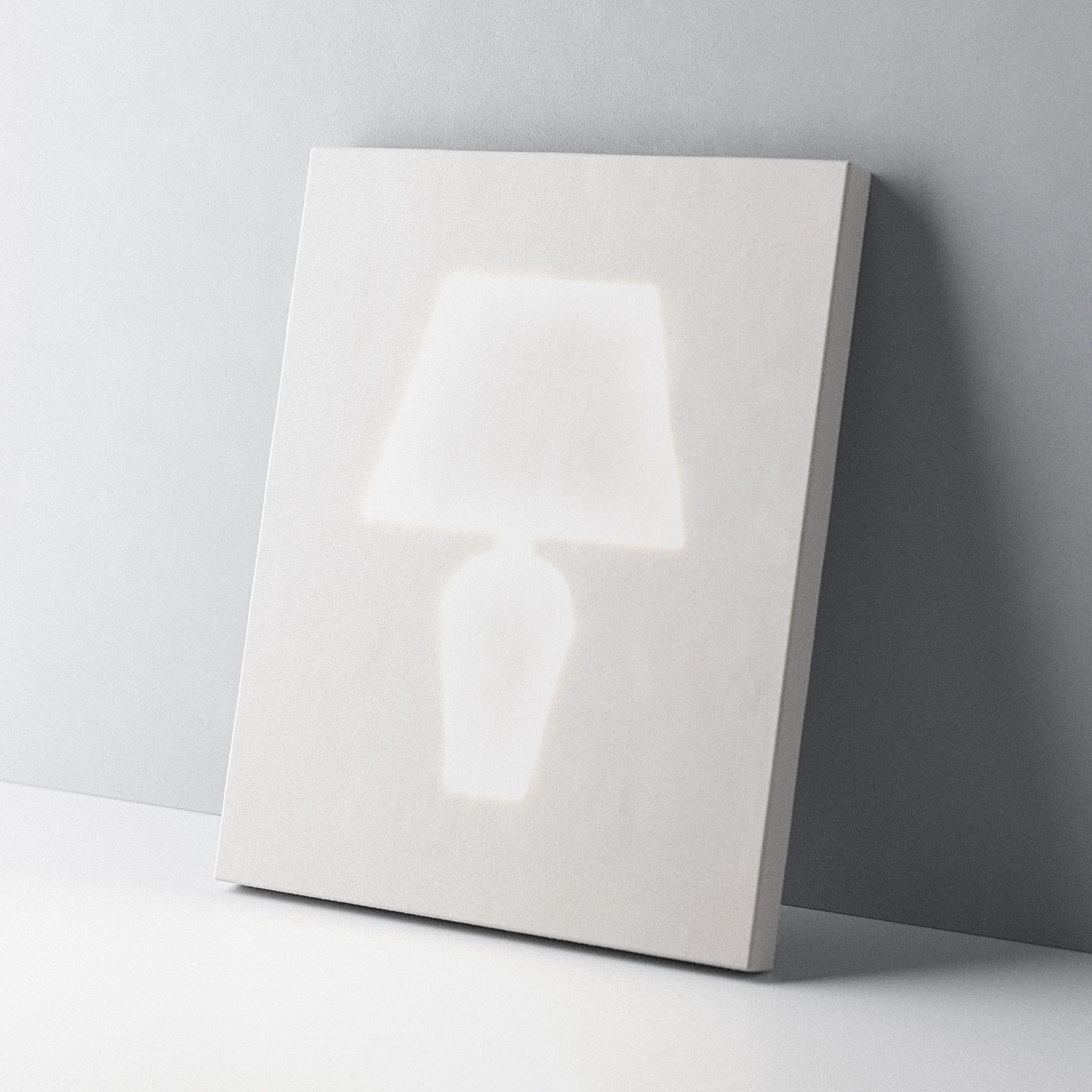 Minimalist white wall light with a geometric lampshade design