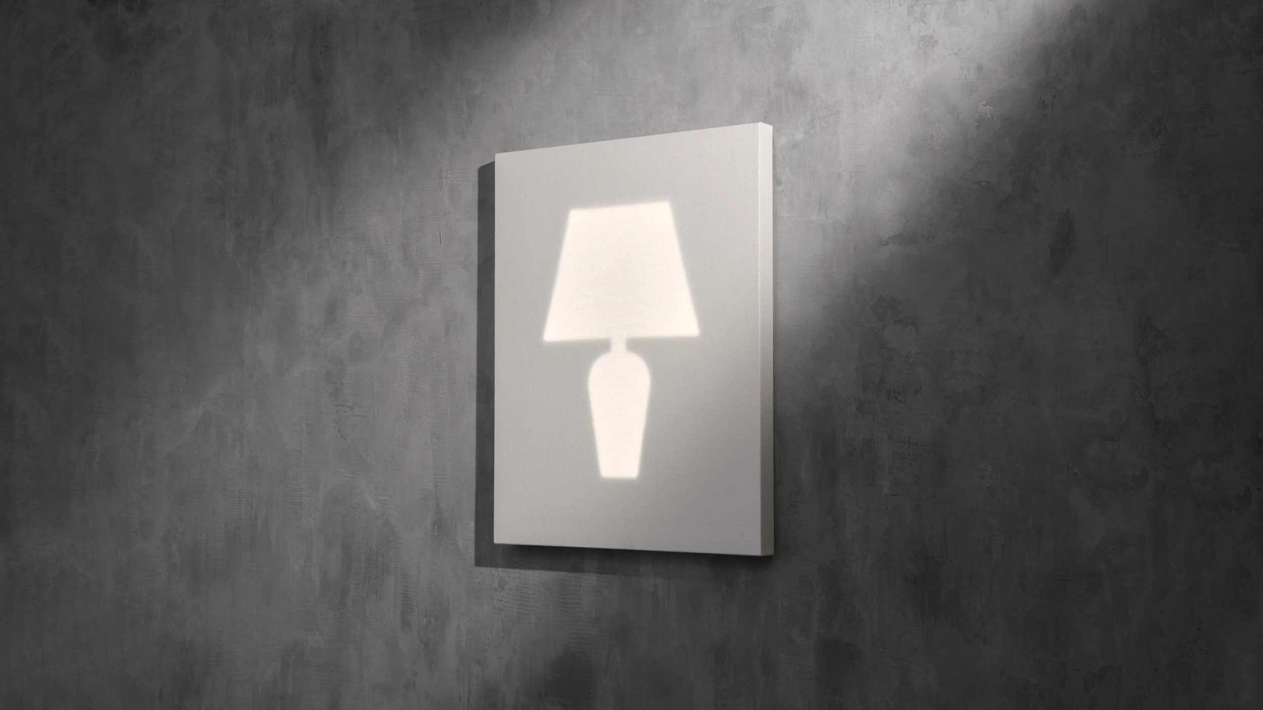 Wall art featuring a backlit lamp silhouette on a gray textured wall.