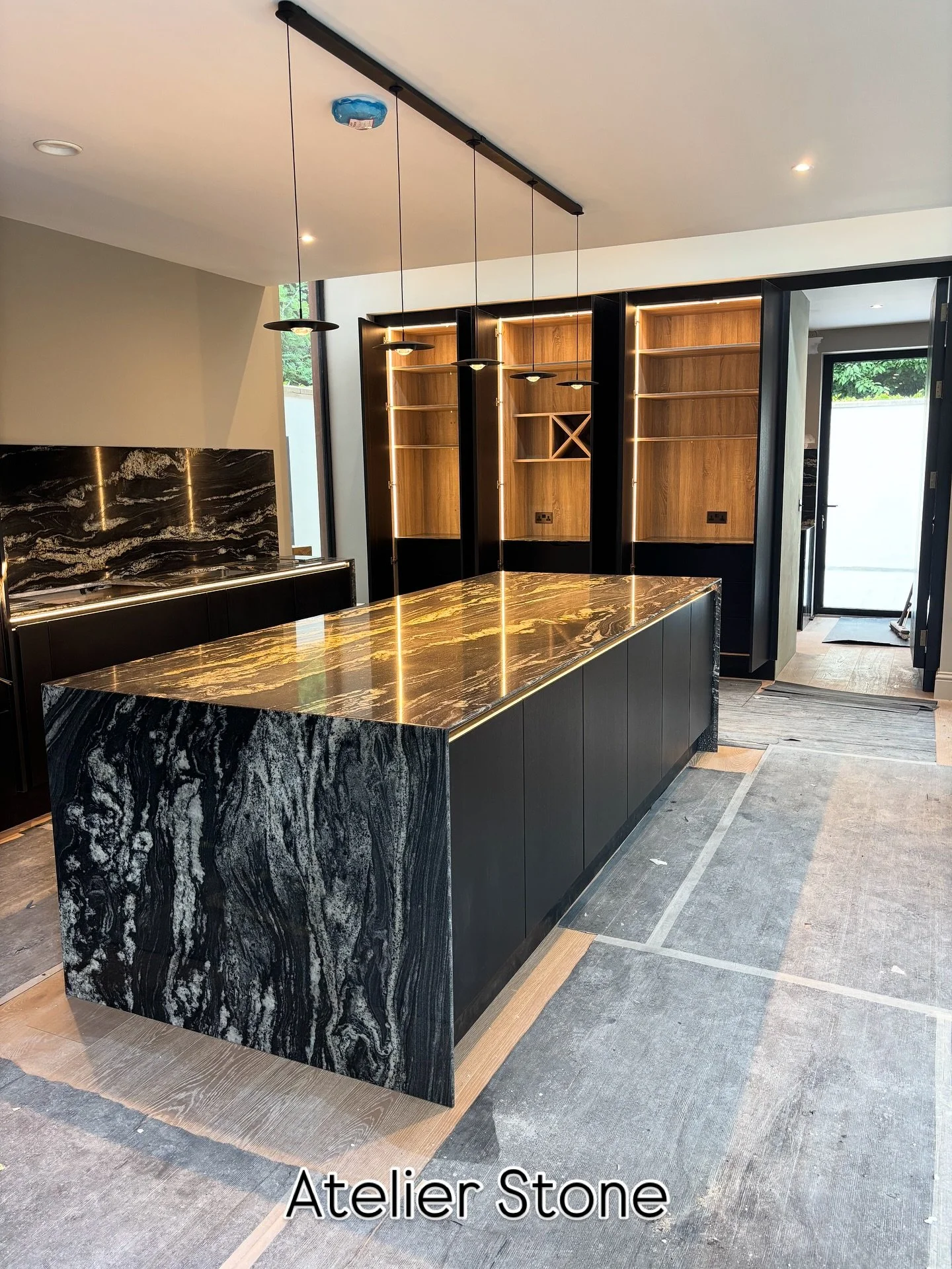 Titanium with shark nose profile, simply stunning natural stone. Full cladding and mitred waterfall ends. Expertly supplied and fitted by our team, Atelier Stone.
#luxurylifestyle #naturalstone #craft #countertops #kitcheninspiration #kitchendesign #