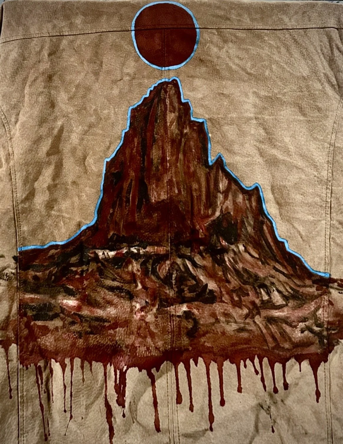Desert landscape on the back of a leather jacket