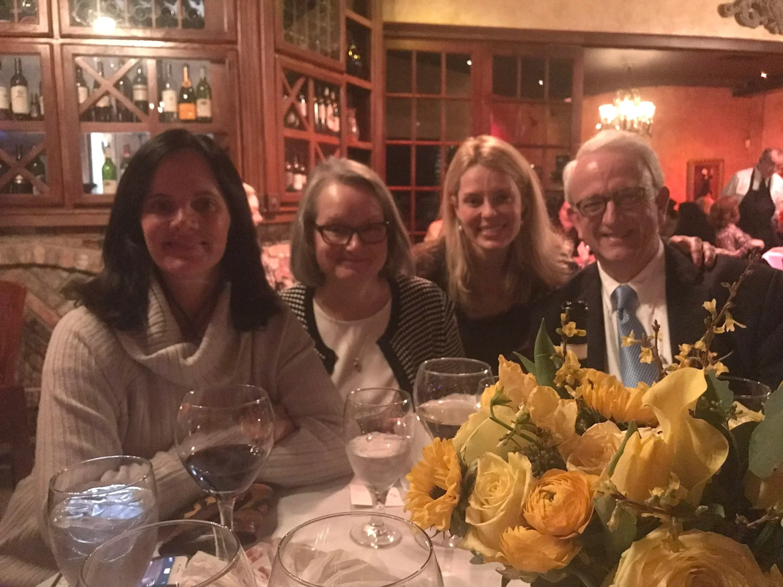 Cat Needham, Beth Hosch, Kate Morris and Charles Hosch at a celebratory dinner