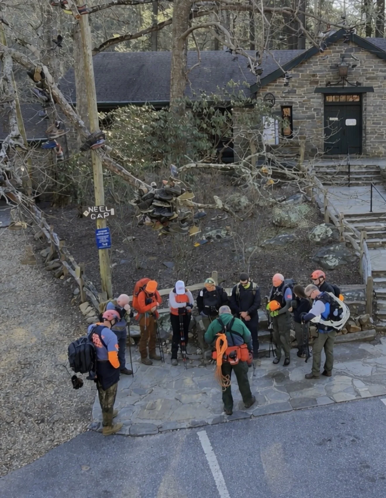 A prayer before the search at Mountain Crossing at Neel's Gap