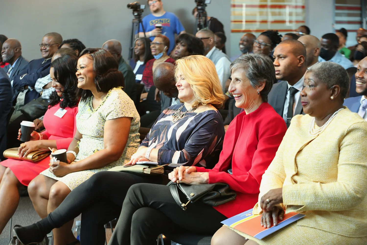 Participants listening closely in the front rows of the Assembly