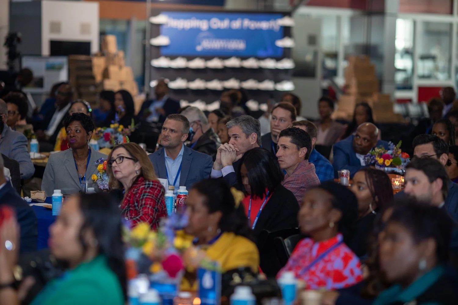 A crowded room of Assembly participants