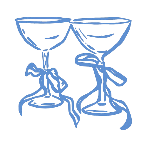 Two wine glasses with ribbons tied around the stems.