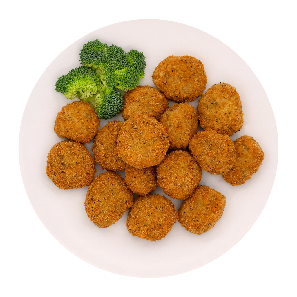 Fried croquettes with broccoli on a white plate