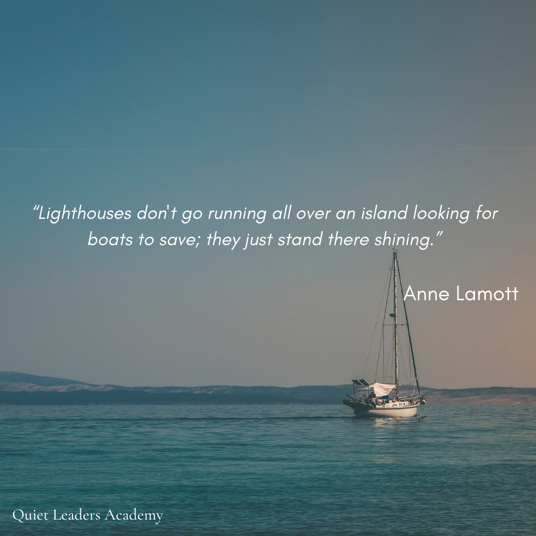 A sailboat on calm water with a quote overlay that reads, "Lighthouses don't go running all over an island looking for boats to save; they just stand there shining." by Anne Lamott, with "Quiet Leaders Academy" in the bottom left corner.