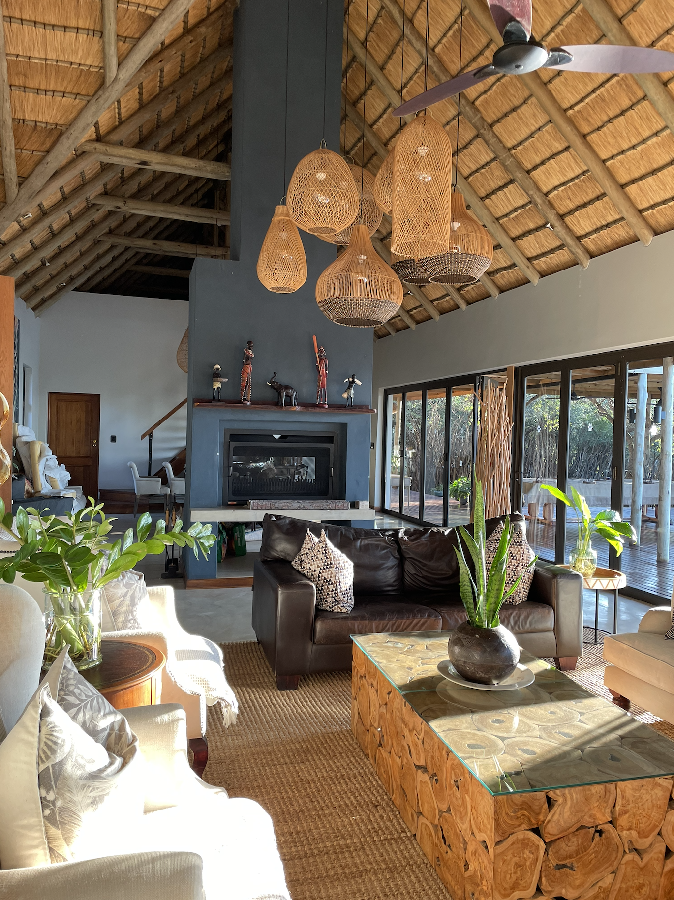 Luxury lodge interior with warm natural lighting and contemporary safari décor.