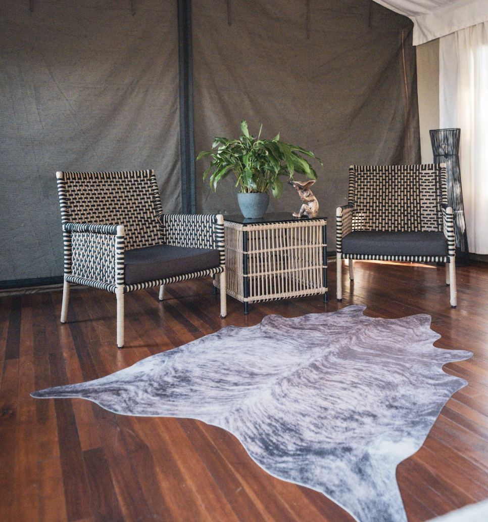 Eco-lodge bedroom featuring soft textiles and modern African design.