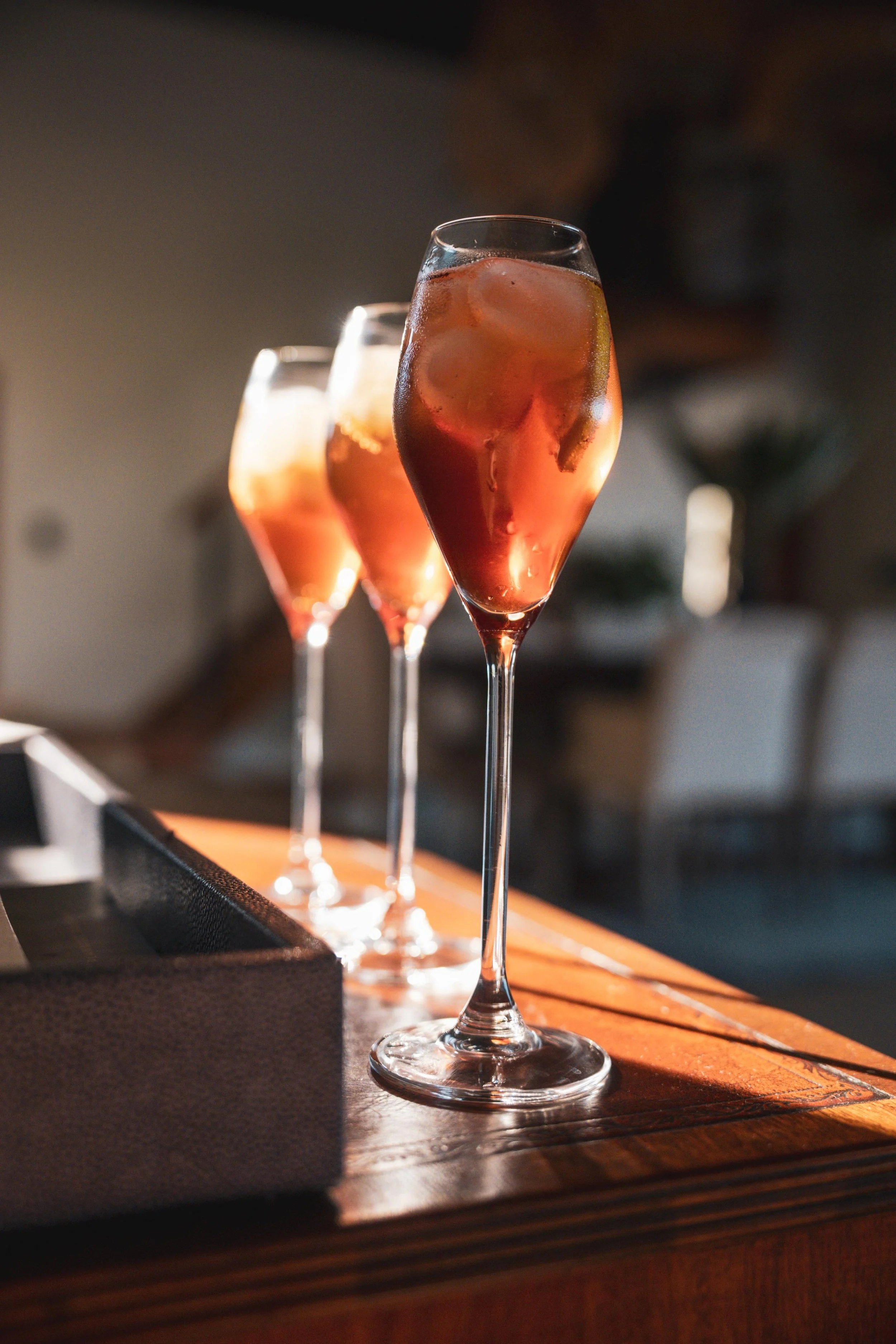 Champagne glasses served at the lodge during sunset drinks.