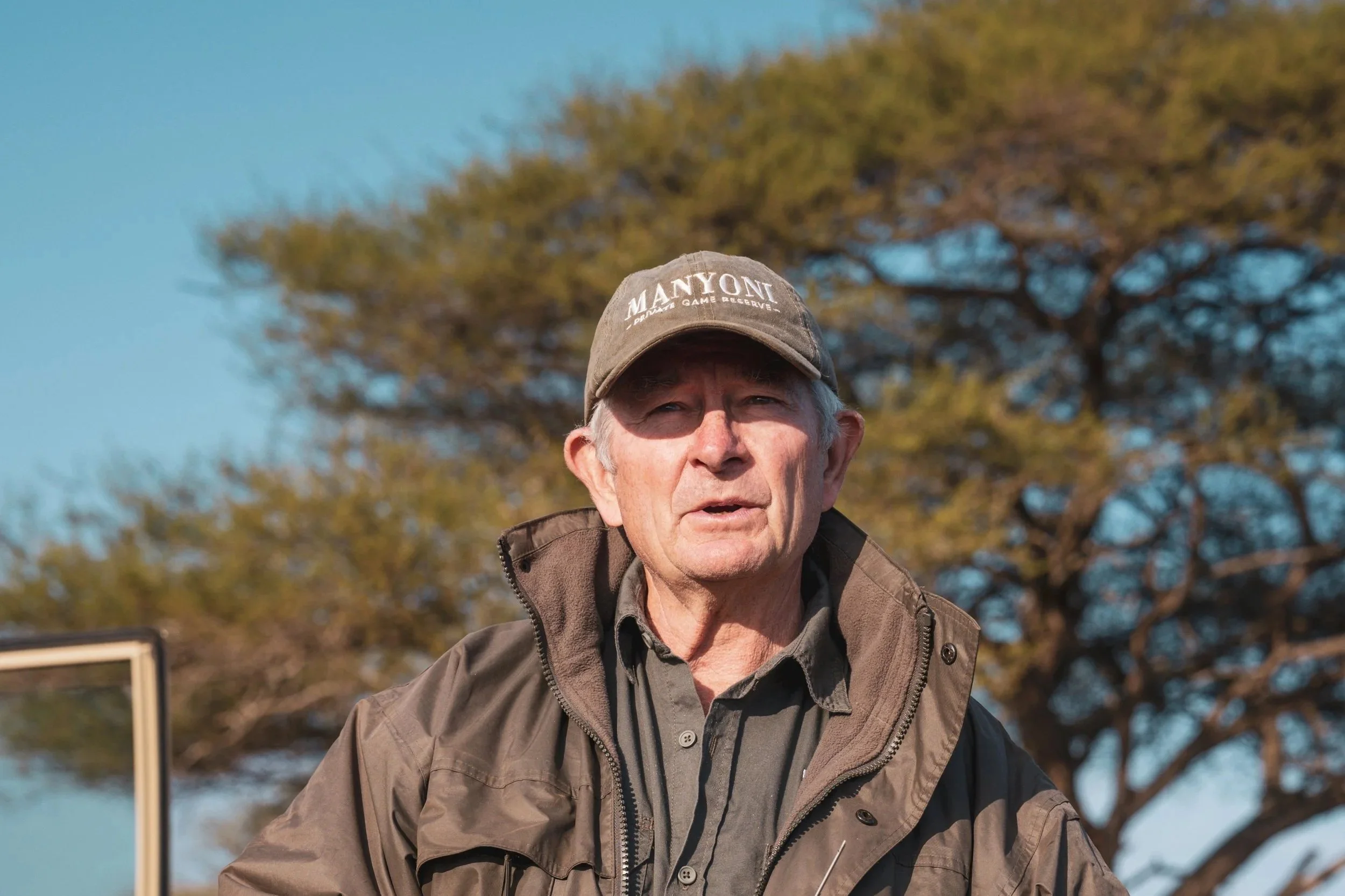 Wildlife veterinarian from Manyoni Private Game Reserve speaking during a wildlife conservation briefing.