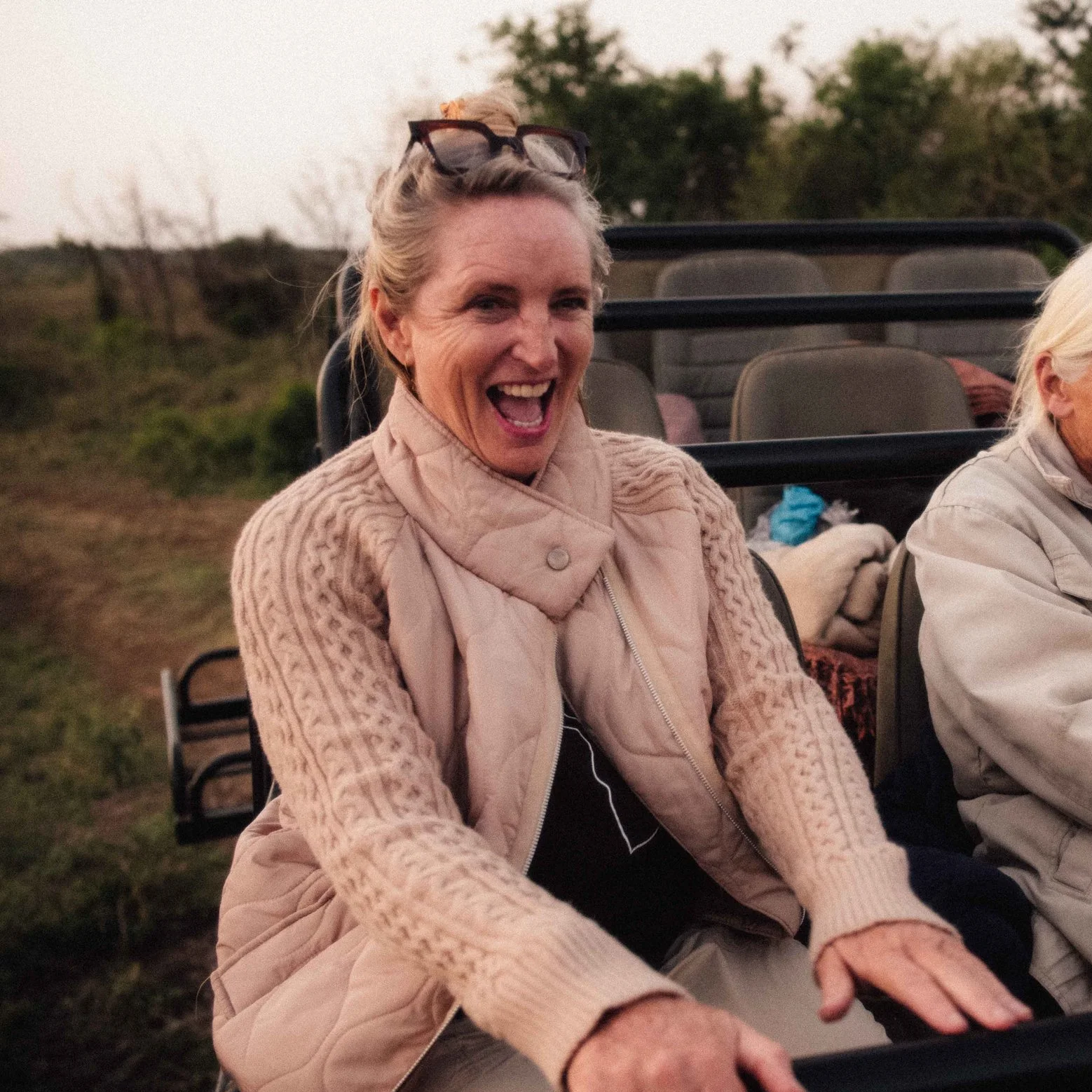 Guest enjoying a game drive with Honey Guide in the Zululand bush.