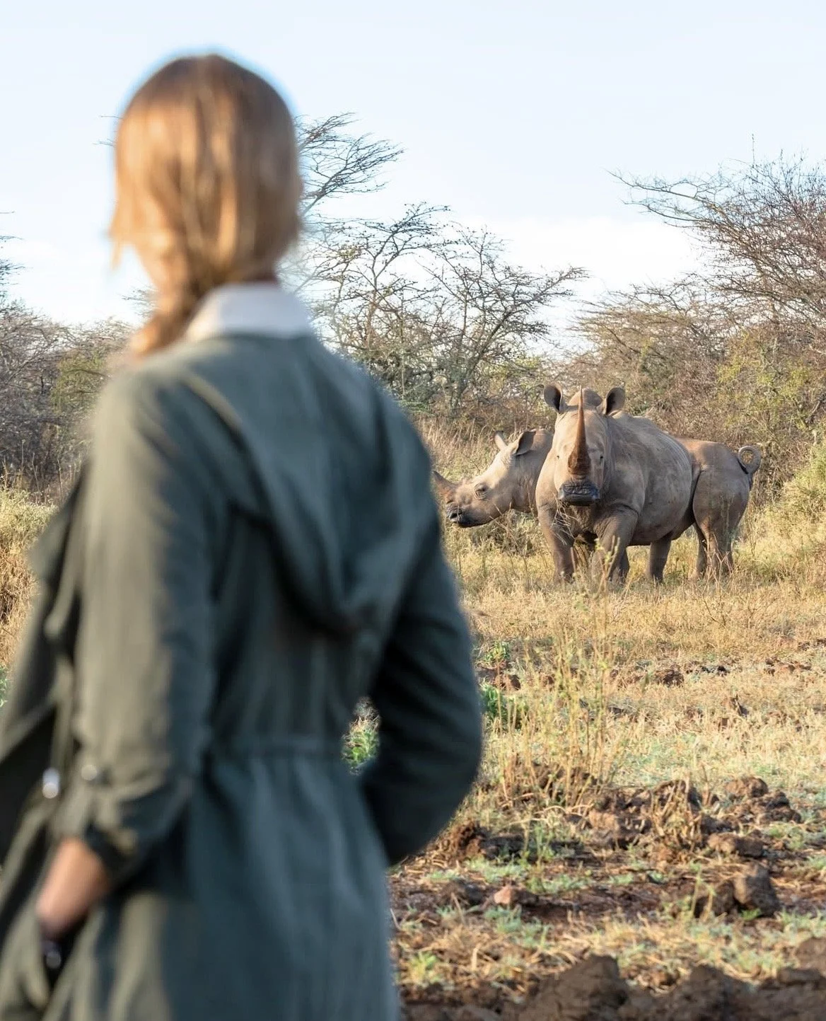 Guest walking in the bush near the lodge during a guided outing.