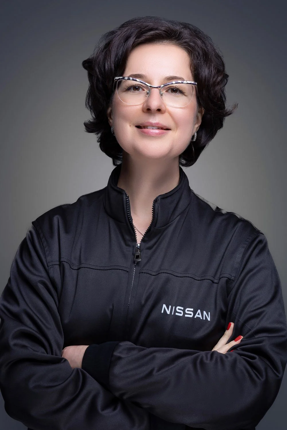 Professional portrait of female engineer photographed for corporate branding and executive profile in Dubai.