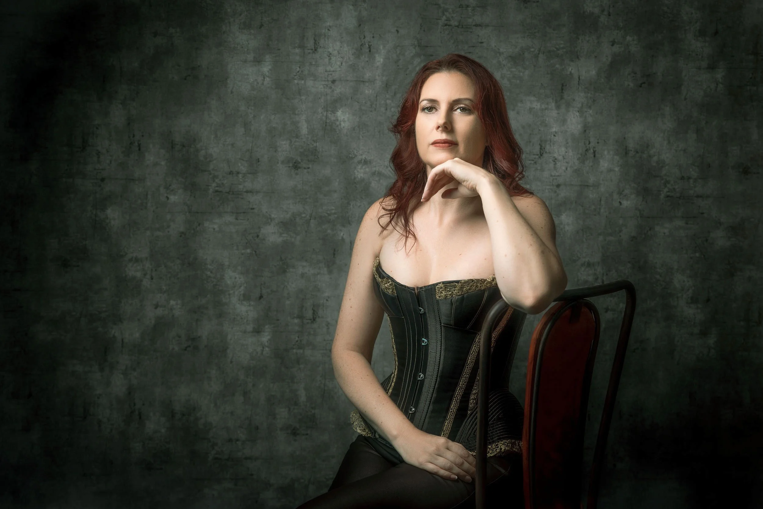 Studio fashion portrait photographed in Dubai with contemporary styling and clean background.