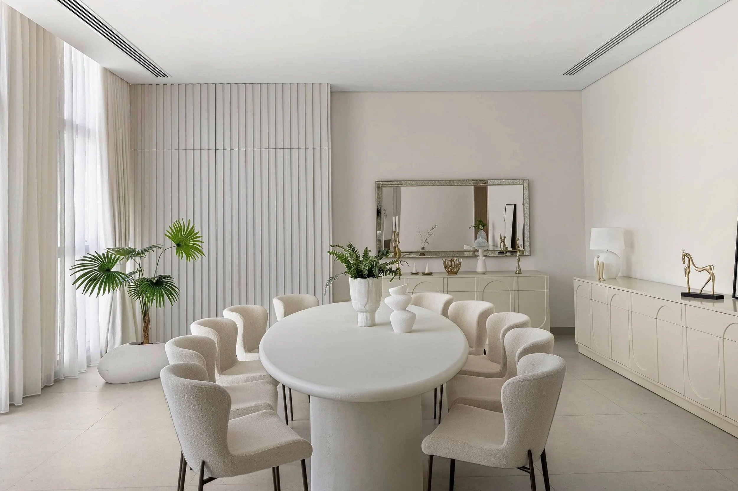Contemporary living room interior photography with minimal styling and warm textures