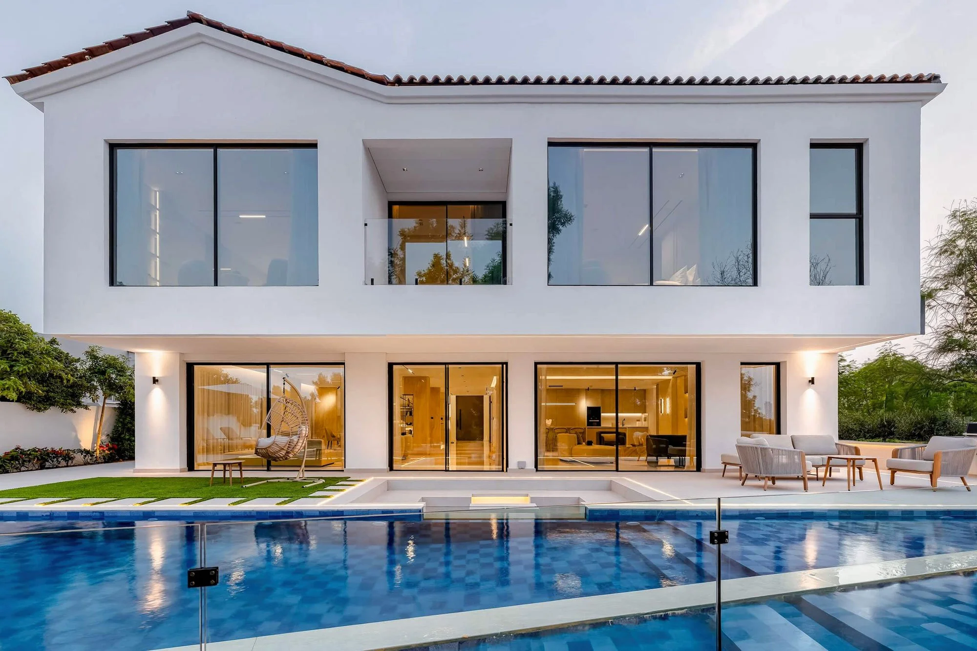 Luxury villa exterior with pool photography in Dubai showcasing contemporary architecture