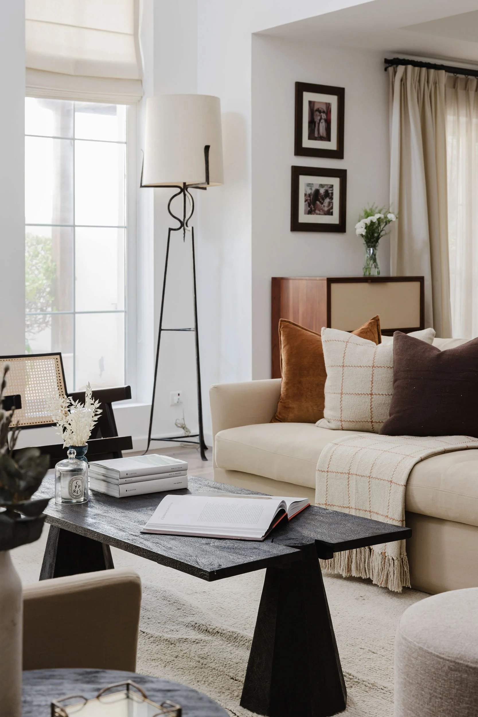 Contemporary living room interior photography with minimal styling and warm textures