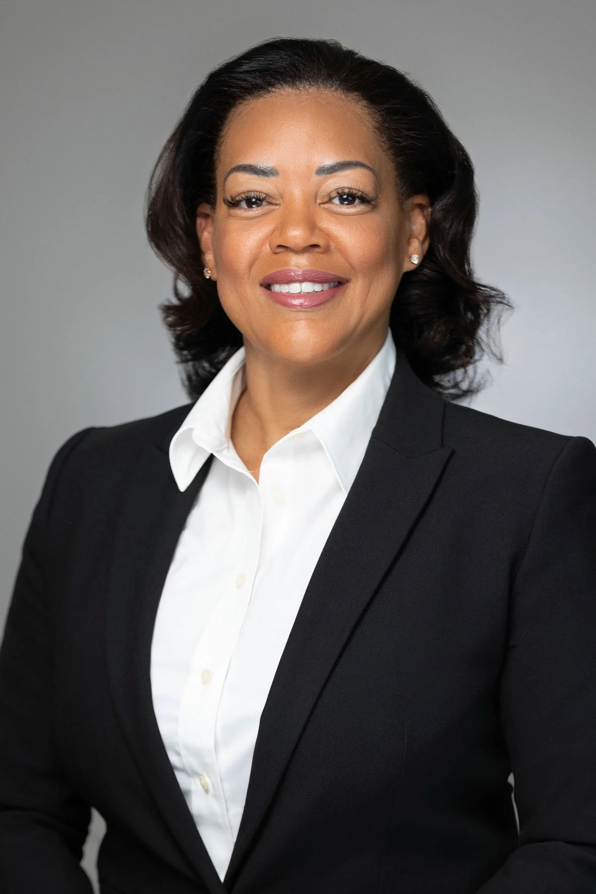 Professional headshot of female business executive photographed for corporate leadership profile and company website.