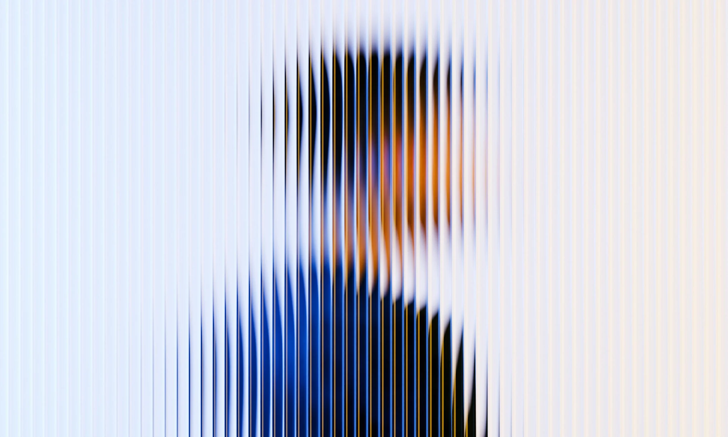 Abstract pattern with vertical lines revealing a blurred image of a person in a suit and tie.