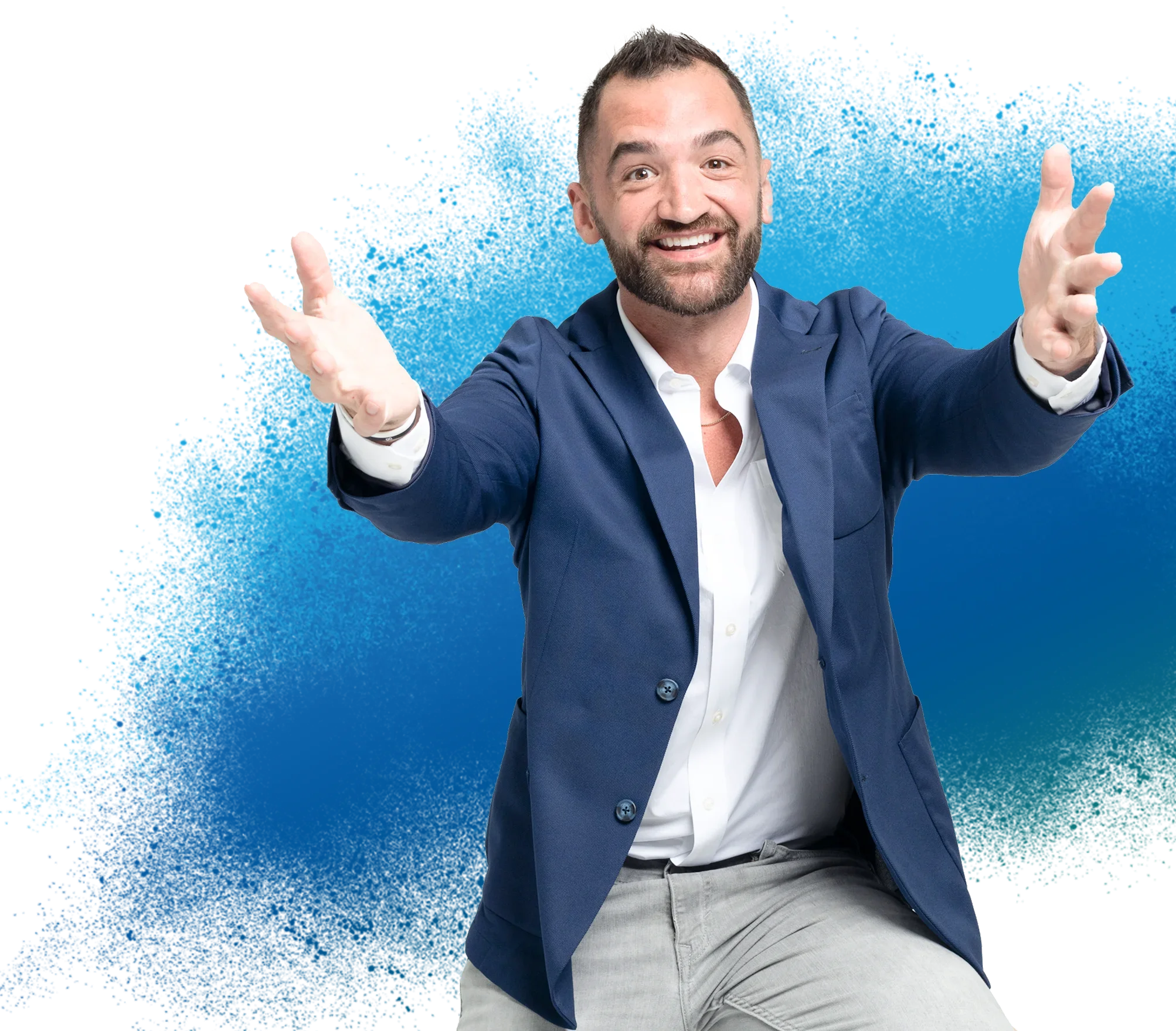 A man in a navy blazer and white shirt reaching out with a cheerful expression, standing in front of a blue background.