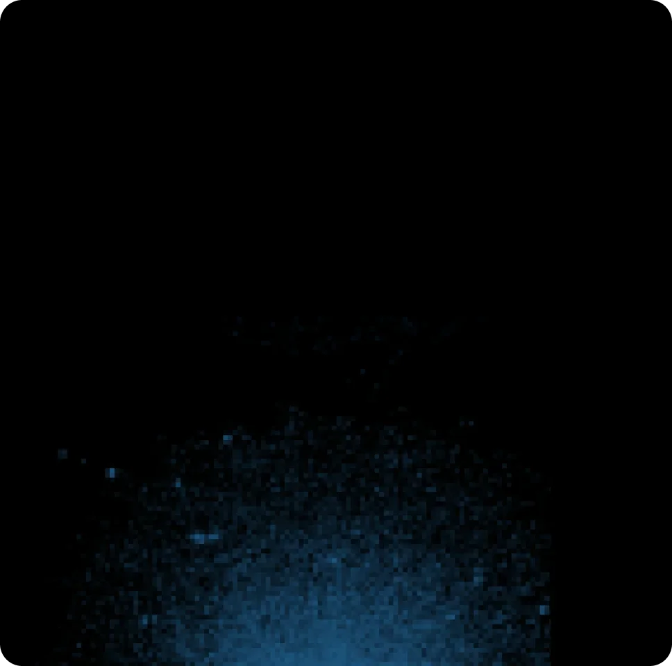 Nighttime view of the Milky Way galaxy with a silhouette of trees in the foreground