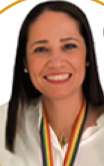 Smiling woman wearing a white shirt and a medal around her neck.