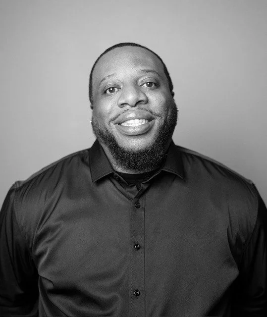 Generic user avatar icon in gray and white