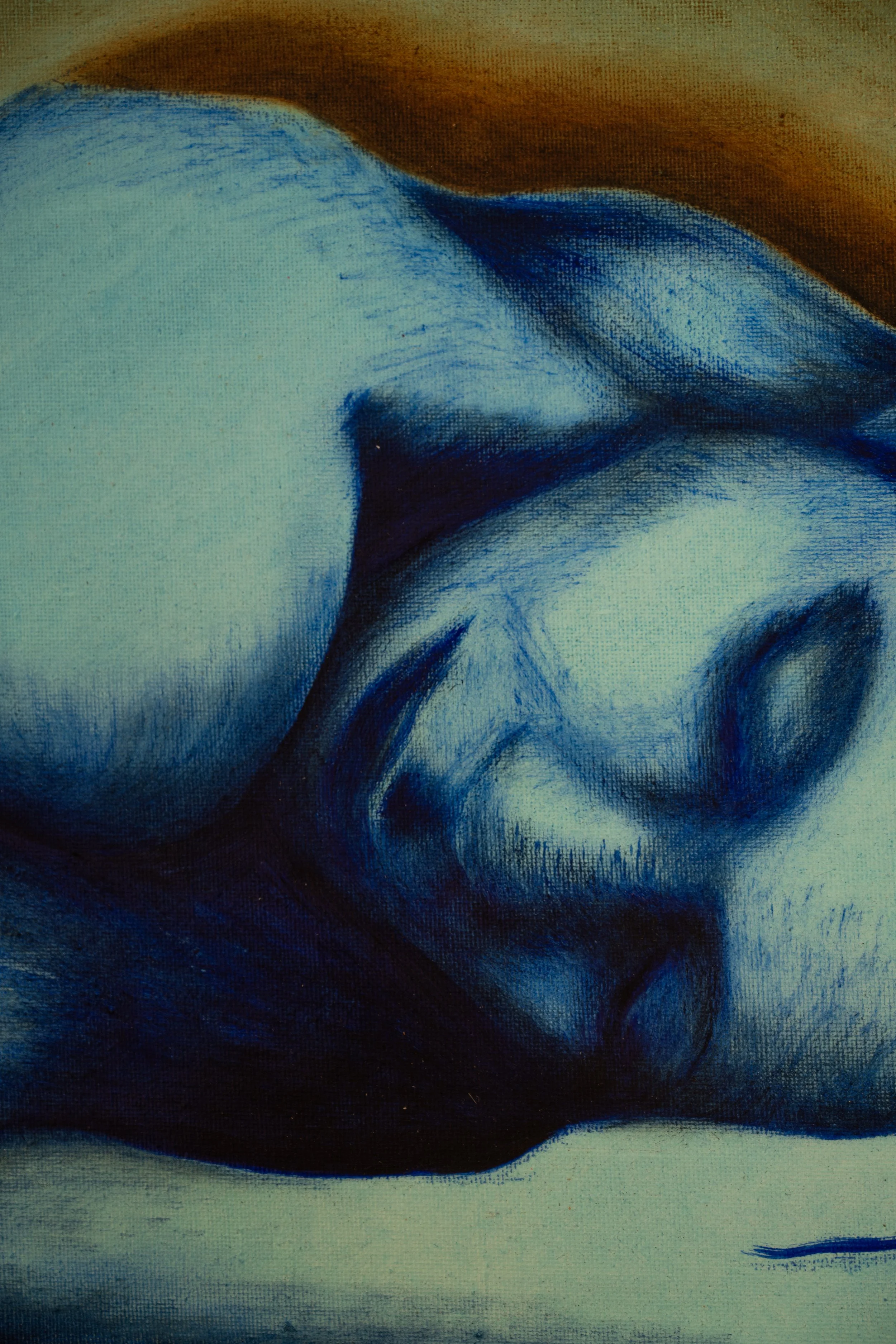 Close-up of a painting of a woman with closed eyes, long dark hair, and soft facial features, resting her head on a surface.