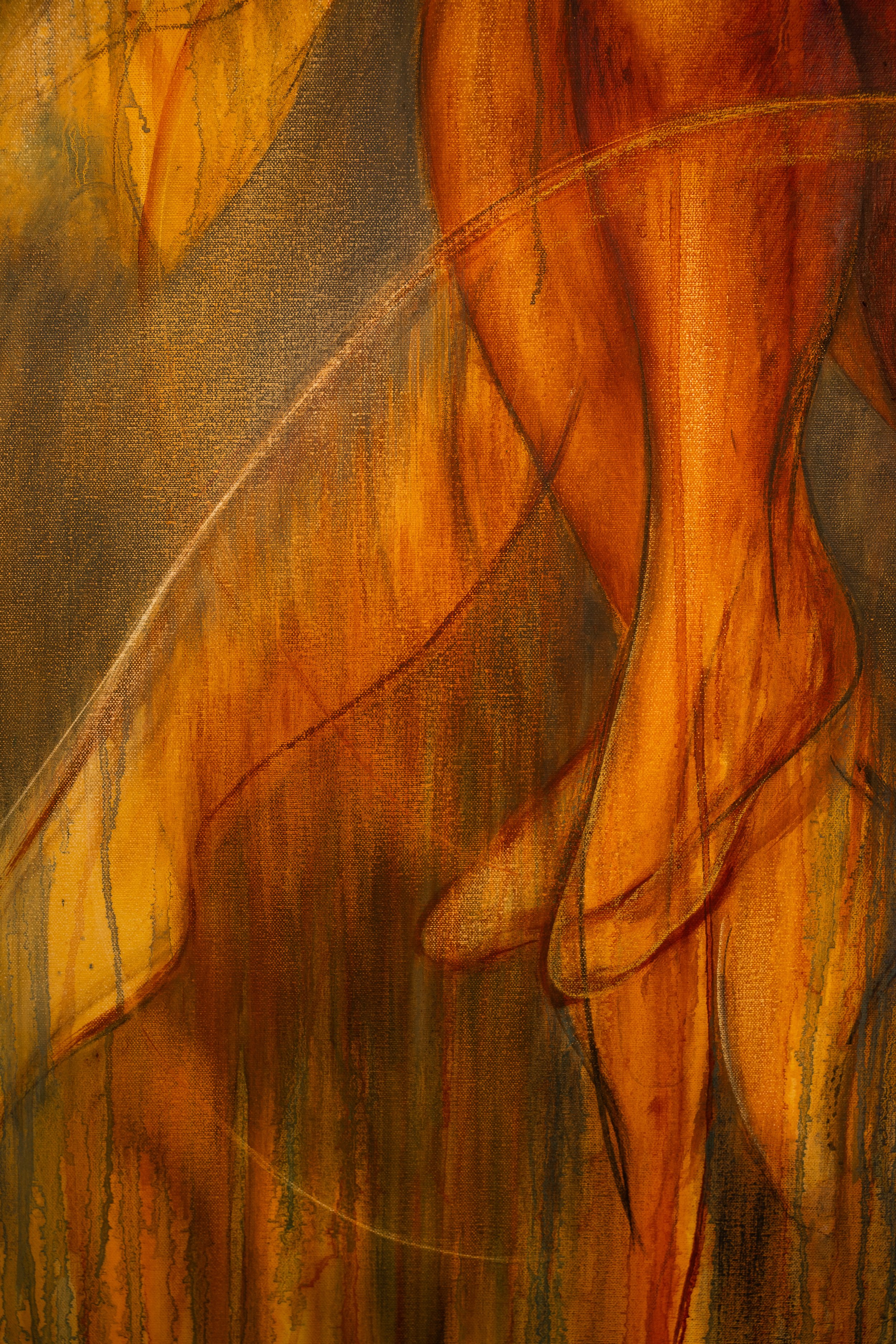 Close-up of an abstract painting with warm orange, yellow, and brown hues, flowing lines, and textured brushstrokes.