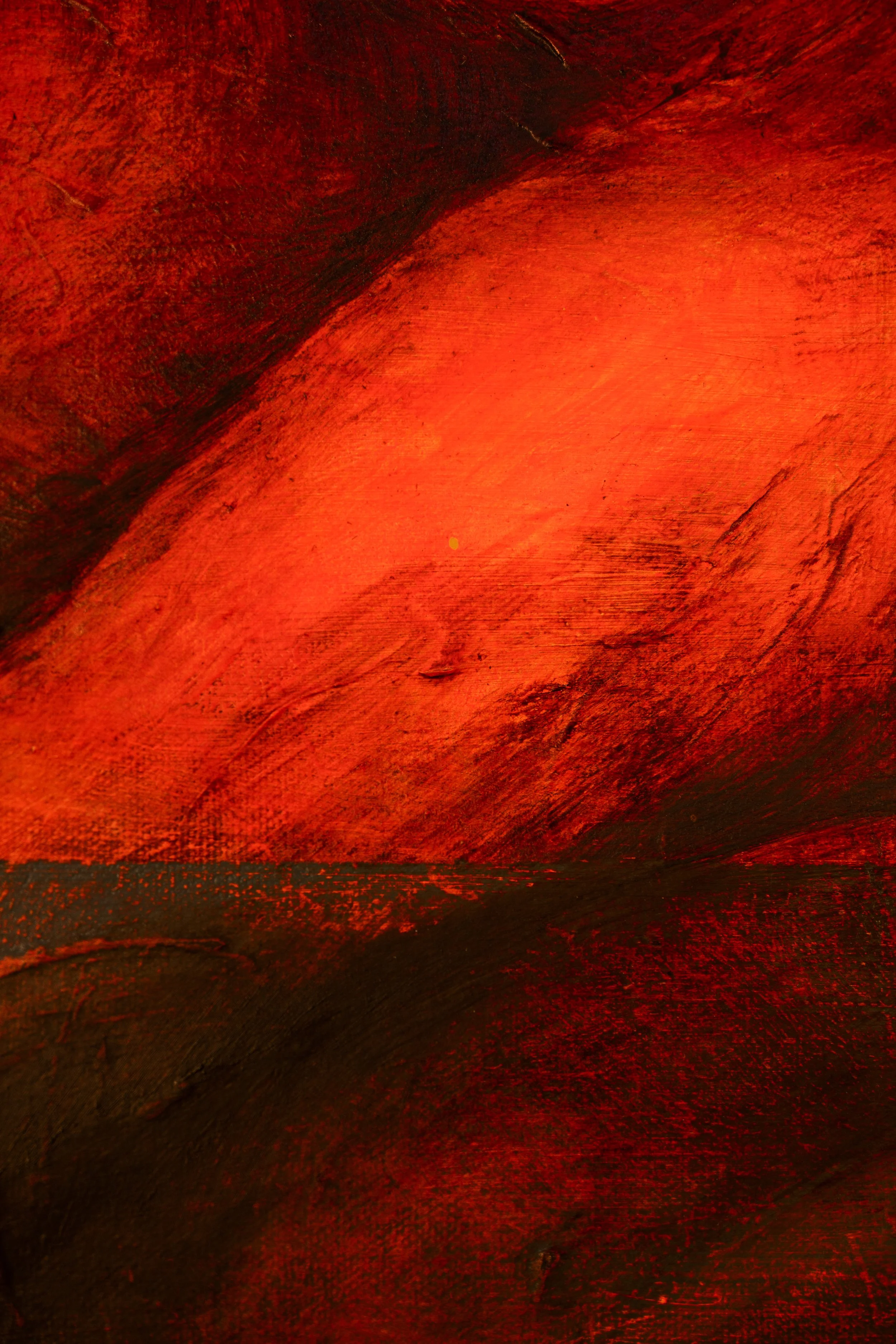 Close-up of a textured red and black painted surface.