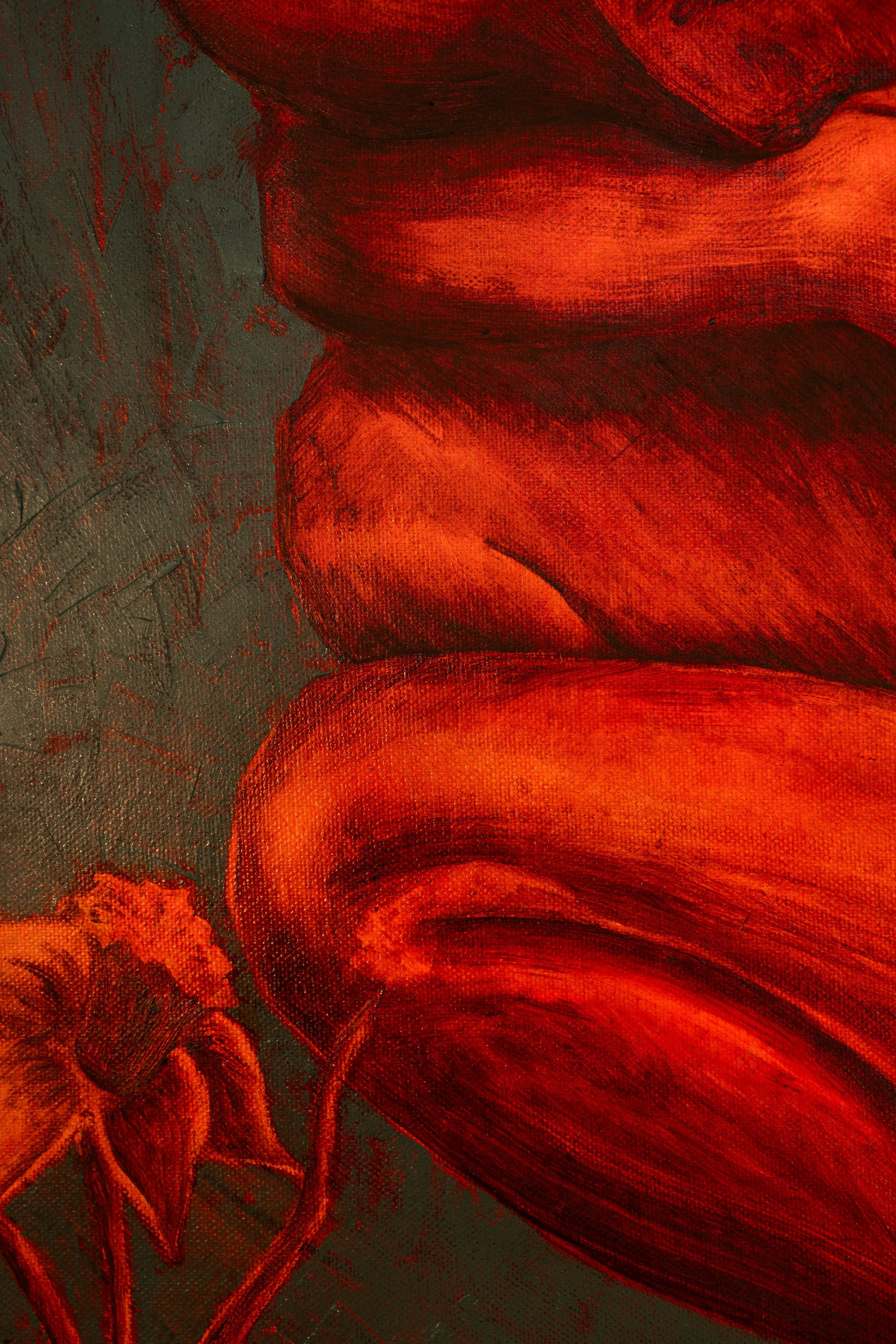 Close-up view of red-orange tulips with green background.